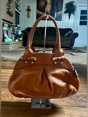 Antonia Melani
• Brown • Leather •
Shoulder Bag • Multiple
Compartments
• New